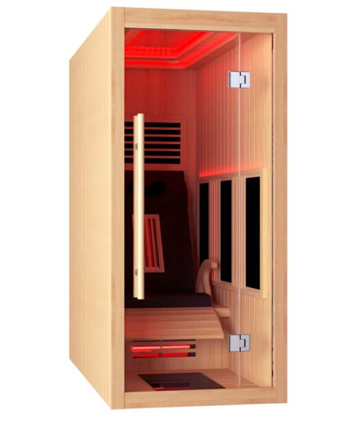 The Single Infrared Cabin Relax Softub Switzerland. Single cabin in light wood with red light in the cabin and a lounger.