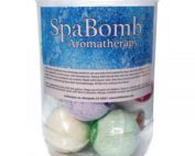 SpaBomb Aromatherapy in weissem Behälter mit grünen, lila und gelben Wasserseifebomben.